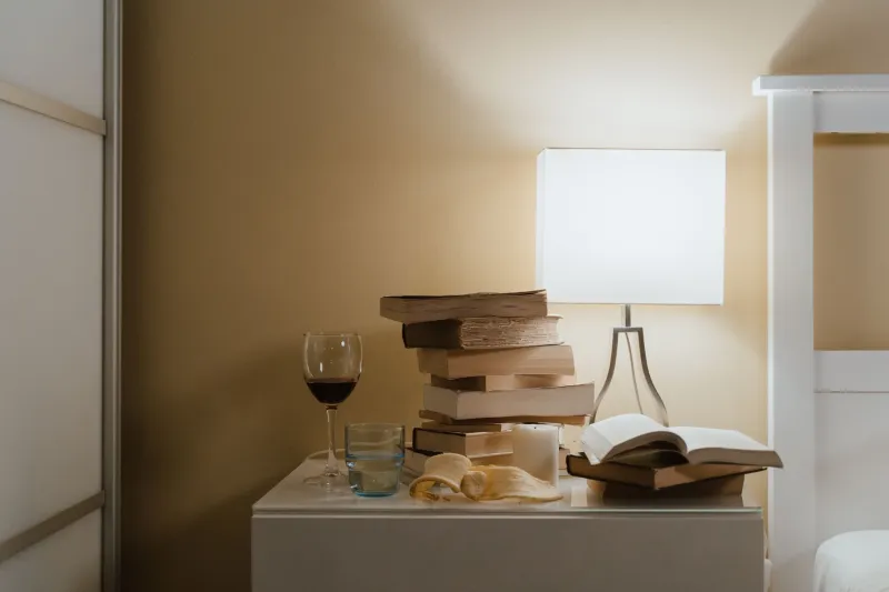 The Night-Time Ritual That Happier Britons Swear By: What's Really on Their Bedside Tables